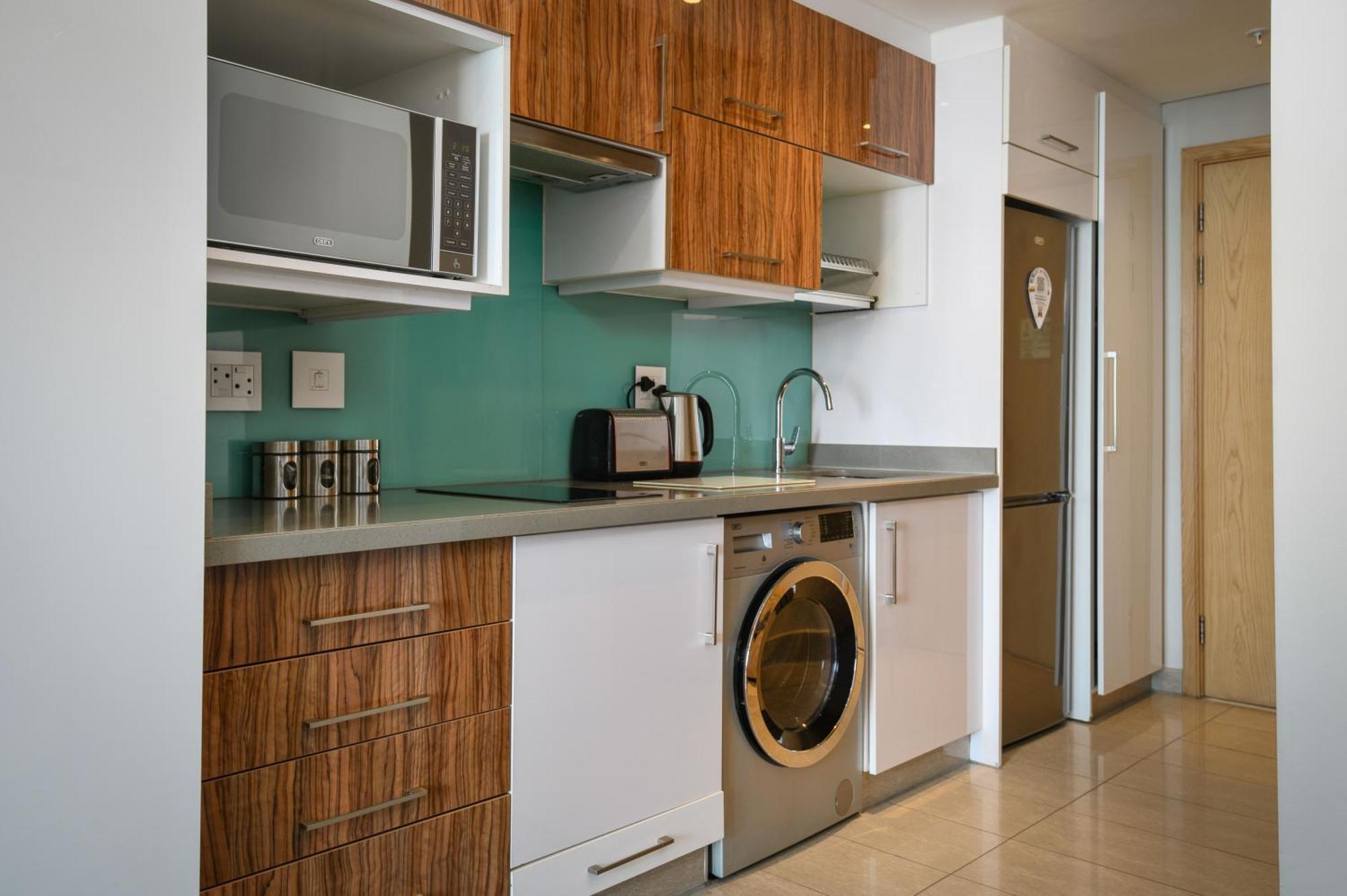 The Capital Pearls Hotel Durban Exterior foto A typical kitchen in a serviced apartment